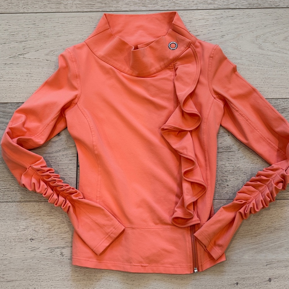 Karma San Suu Asymmetrical Ruffle Full Zip Jacket in Peach